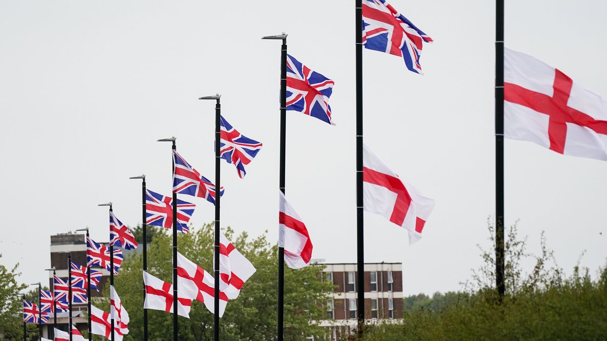 St George's and Union Flags fly by a roadside