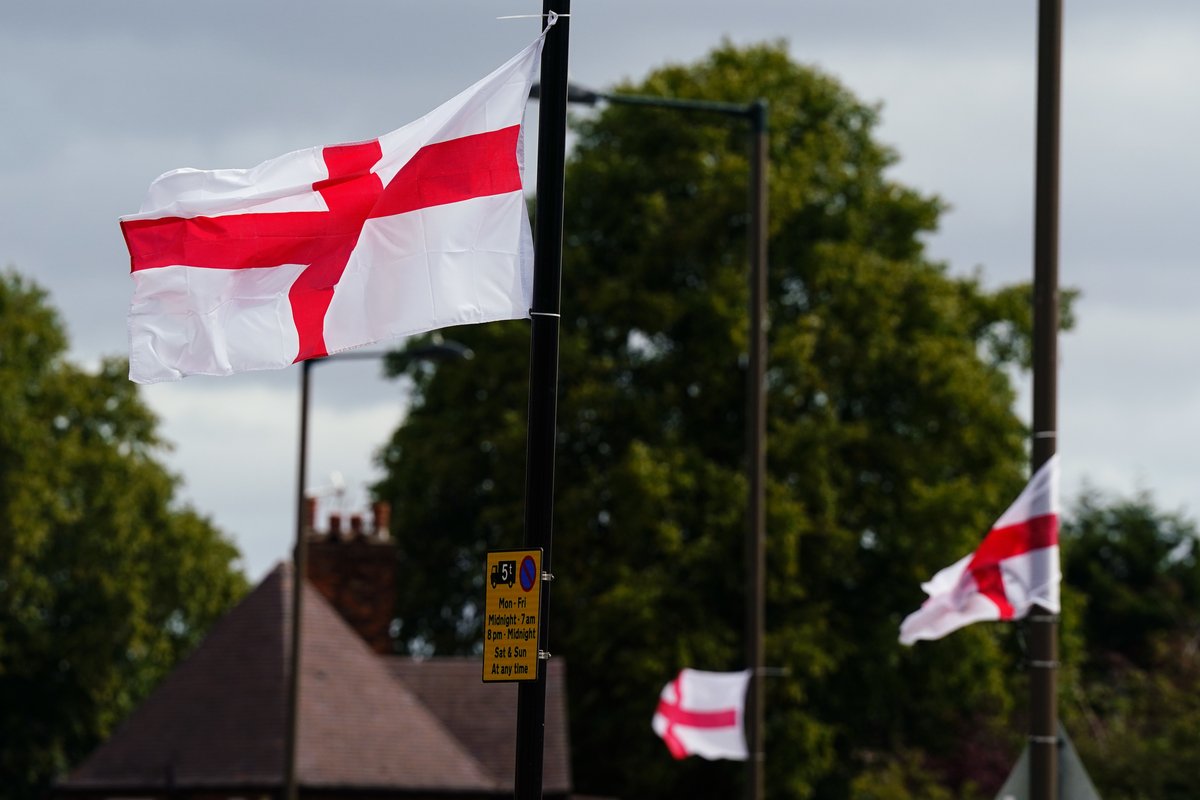 St George's flags fly from lampposts in Highters Heath