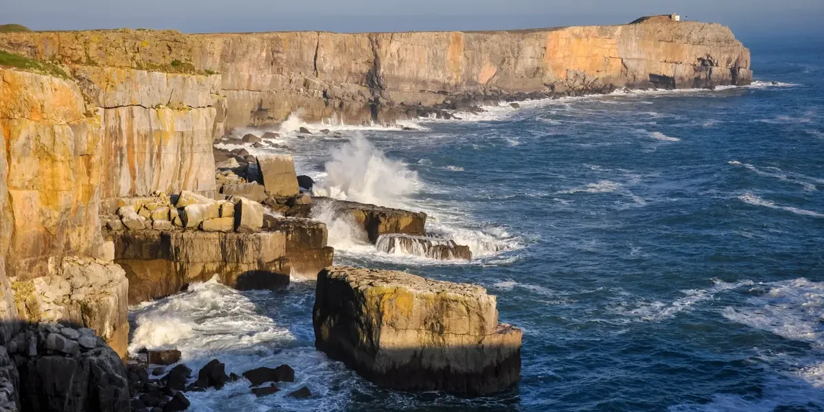 One dead and two others injured after climbers fall into freezing sea off British coast One dead and two others injured after climbers fall into freezing sea off British coast