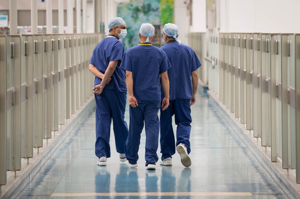 Staff at the Chelsea and Westminster Hospital, London. Picture date: Tuesday March 23, 2021.