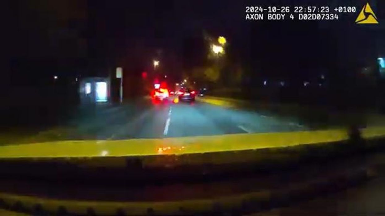 Staggering moment driver rams police car after 100mph pursuit before hiding under a bed