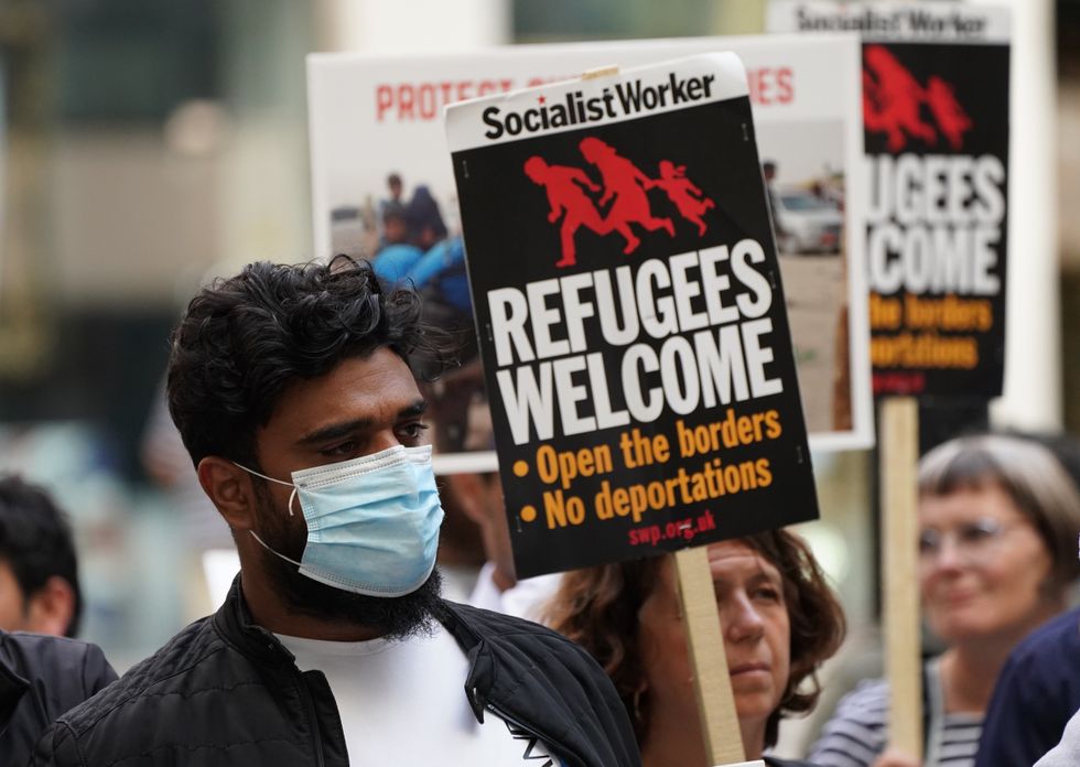 Stand Up to Racism and the Afghan Human Rights Foundation at a protest outside the Home Office in Westminster.