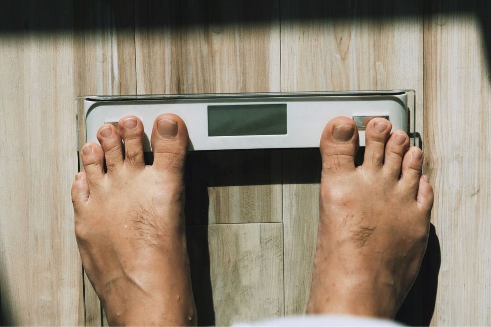 STANDING ON SCALES