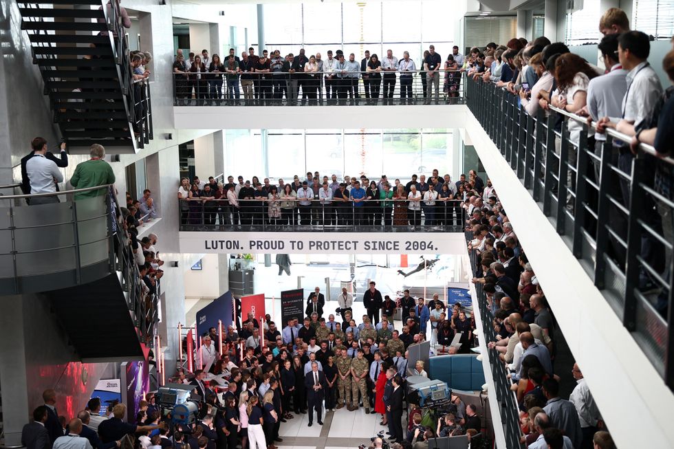 Starmer speaks to members of the staff during a visit to Leonardo, one of the biggest suppliers of defence and security equipment to the UK MOD