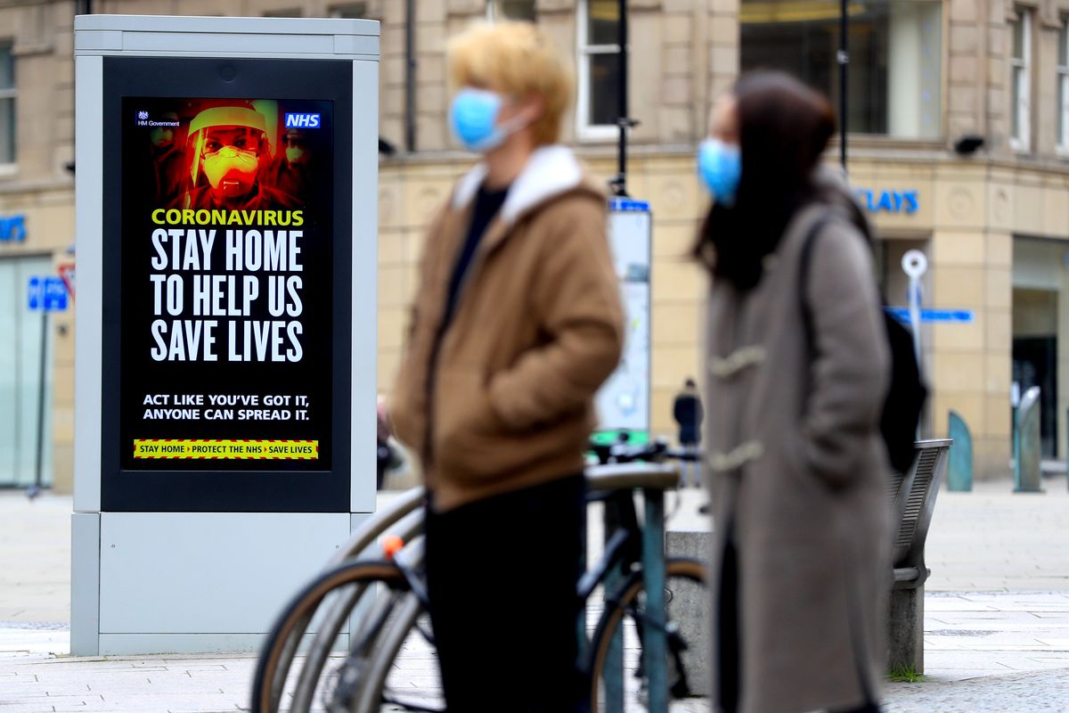 Stay home sign on UK street