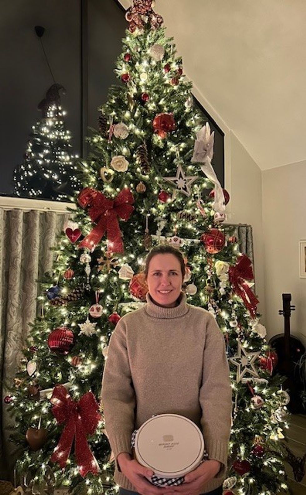 Stella from Gloucestershire with her tin of baked gods.