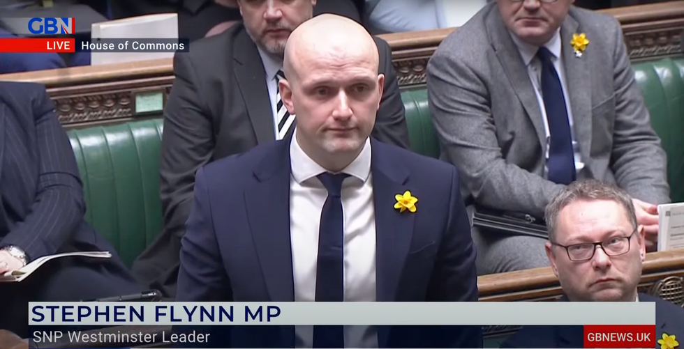 Stephen Flynn standing the House of Commons