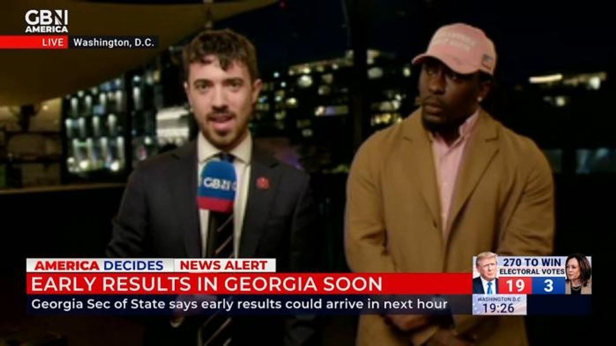 Firefighters rush in to help recount 30,000 votes in crucial US swing state as tech glitches spark chaos