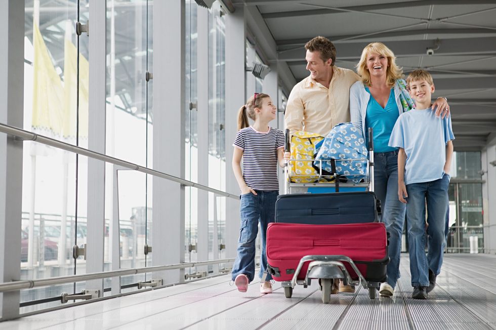 Stock image of family at airport