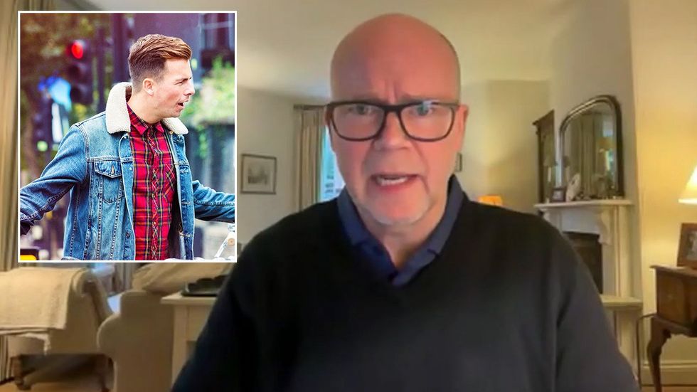 Stock image of man on street, Toby Young