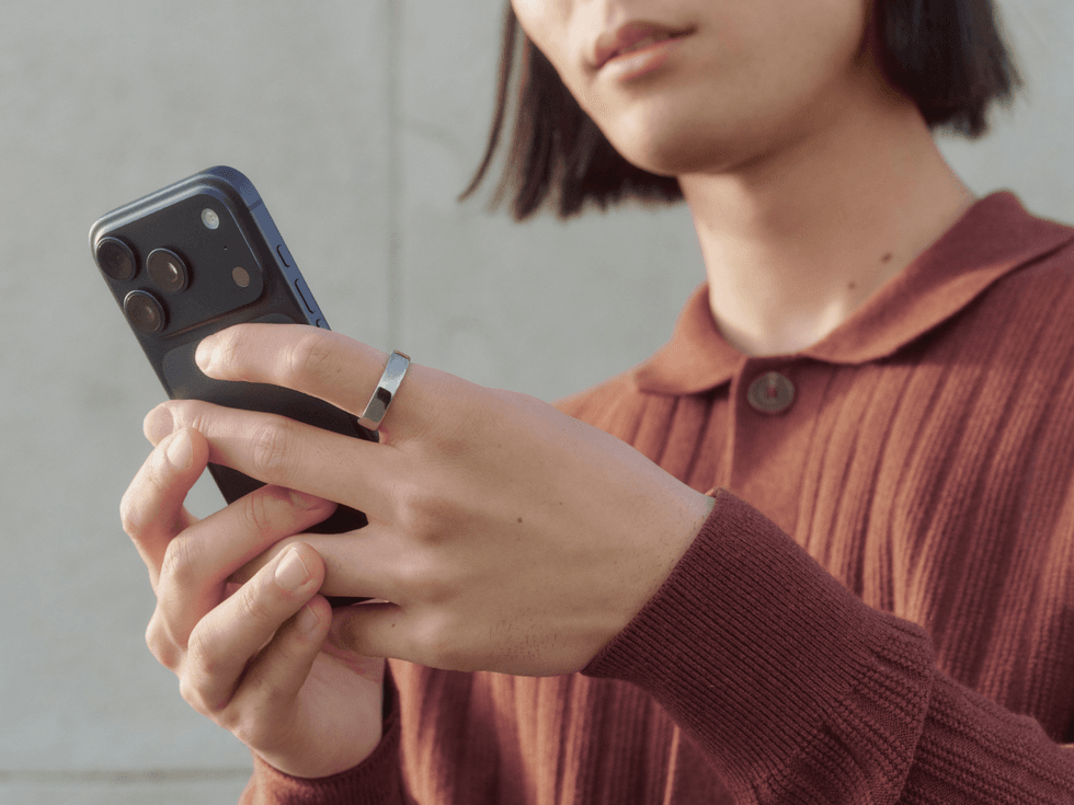 Stock image of model wearing the Oura Ring 5