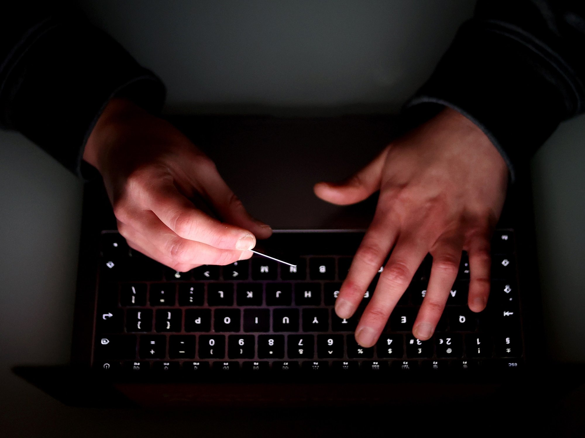 Stock image of online scammer