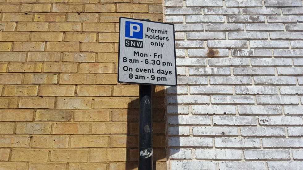 Stock image of parking ticket sign