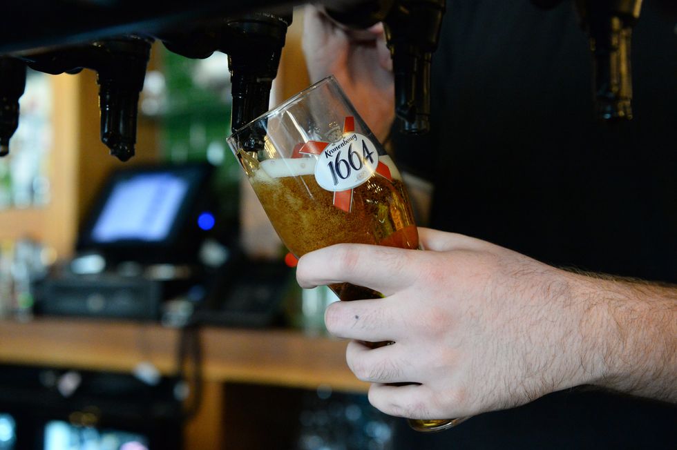 Stock image of pint being poured