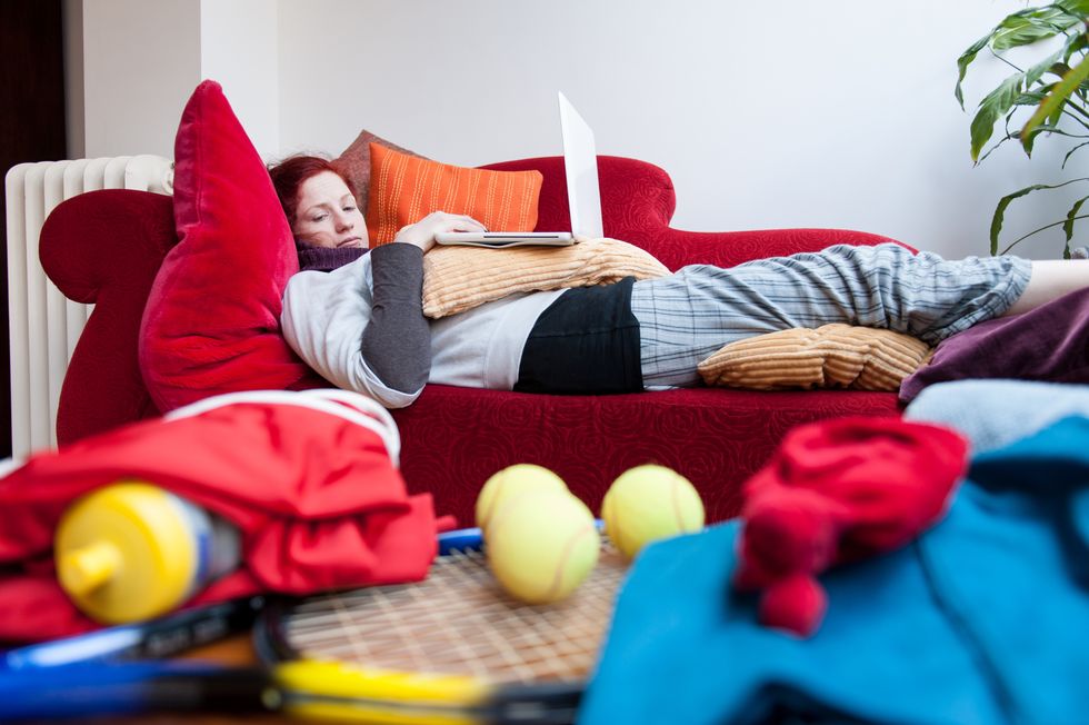 Stock image of woman on sofa
