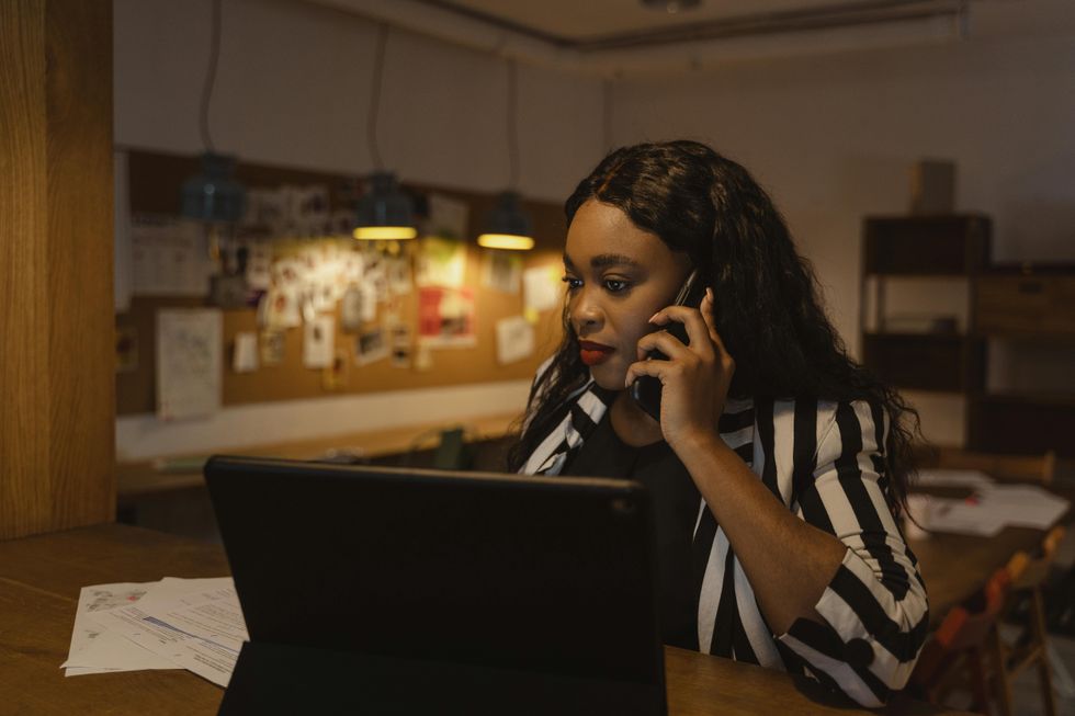 Stock image of woman talking on the phone
