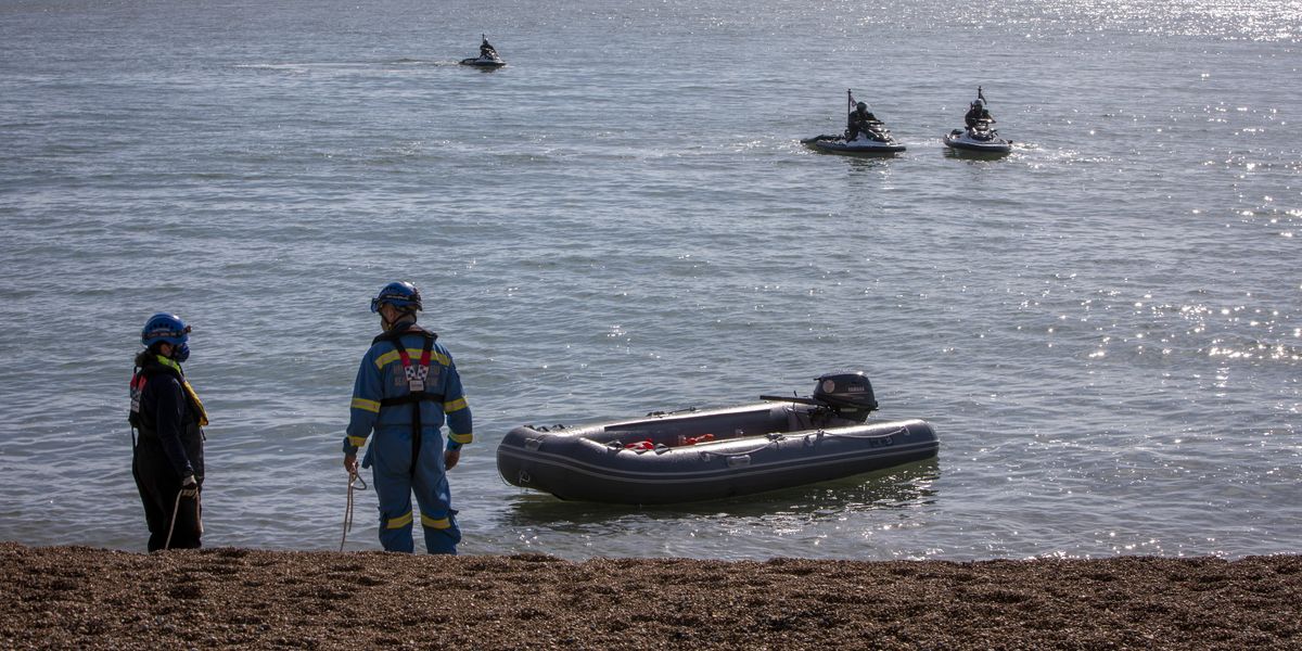NextImg:Two migrants found dead after small boat capsizes off French coast