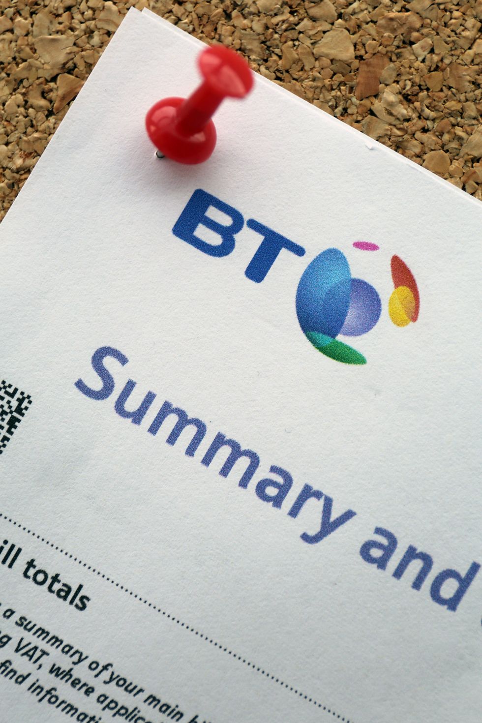 Stock picture of a BT phone bill pinned to a notice board.