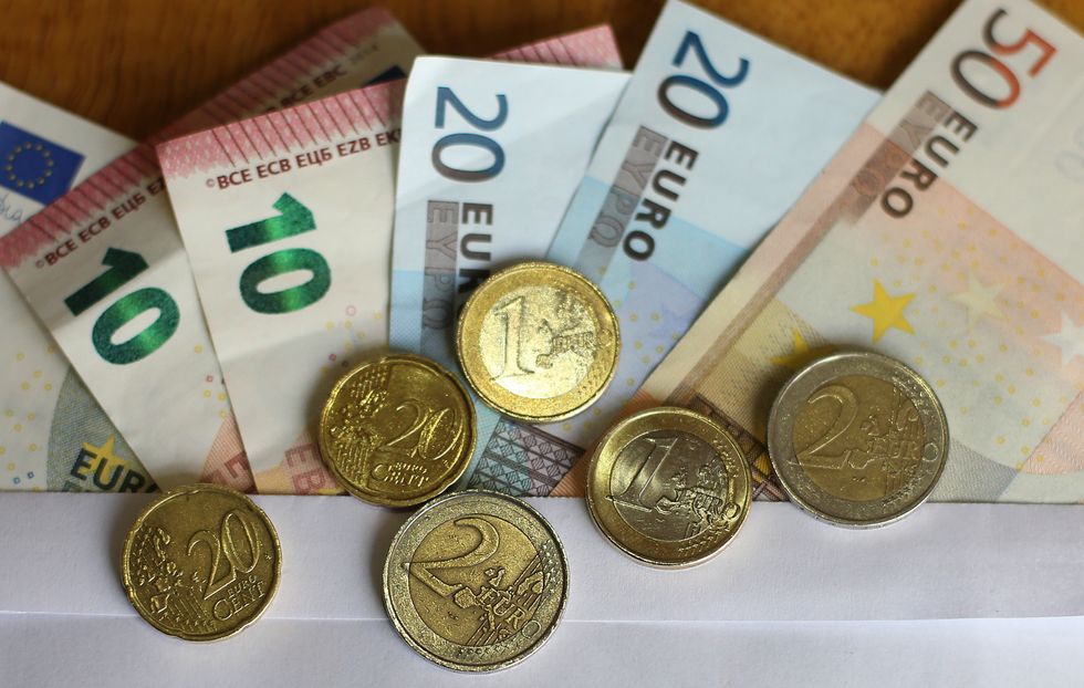Stock picture of euro notes and coins