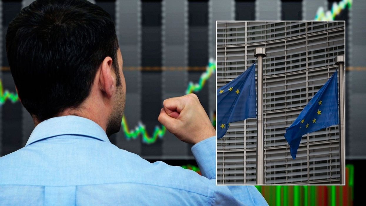 Stock trader happy and EU flag