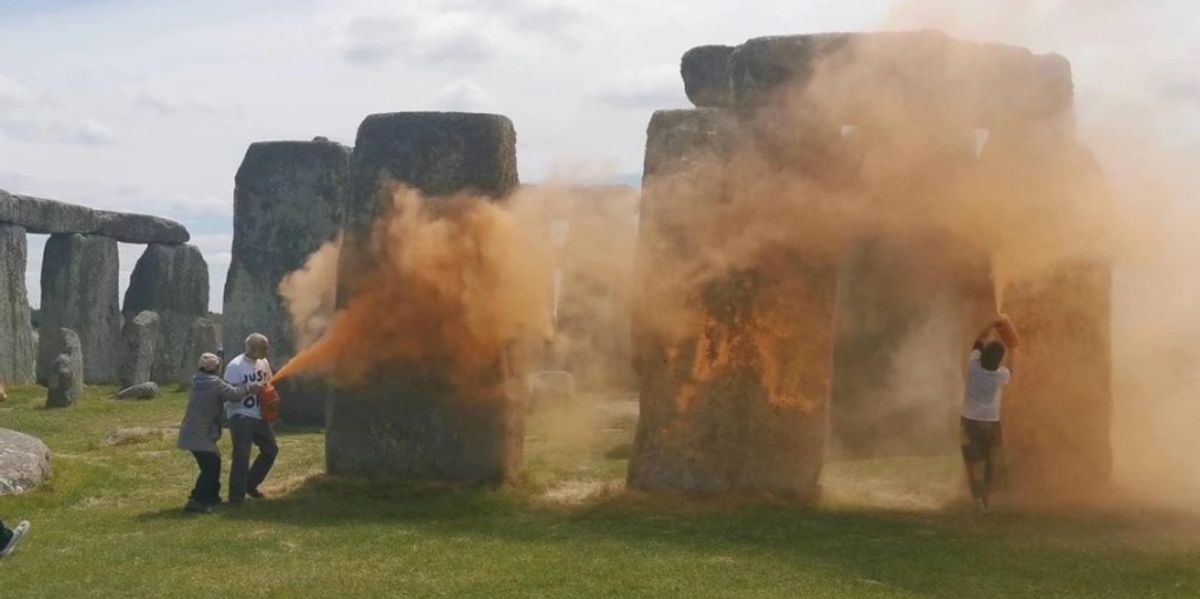 NextImg:Stonehenge: Just Stop Oil protesters charged with destroying ancient protected monument after throwing orange paint powder at Stonehenge