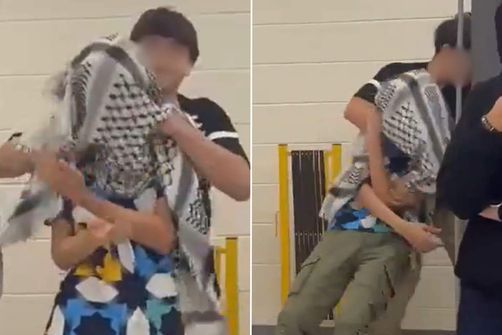 Student is draped in a keffiyeh