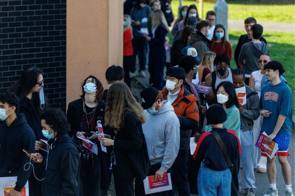 STUDENTS QUEUE MENINGITIS VACCINE