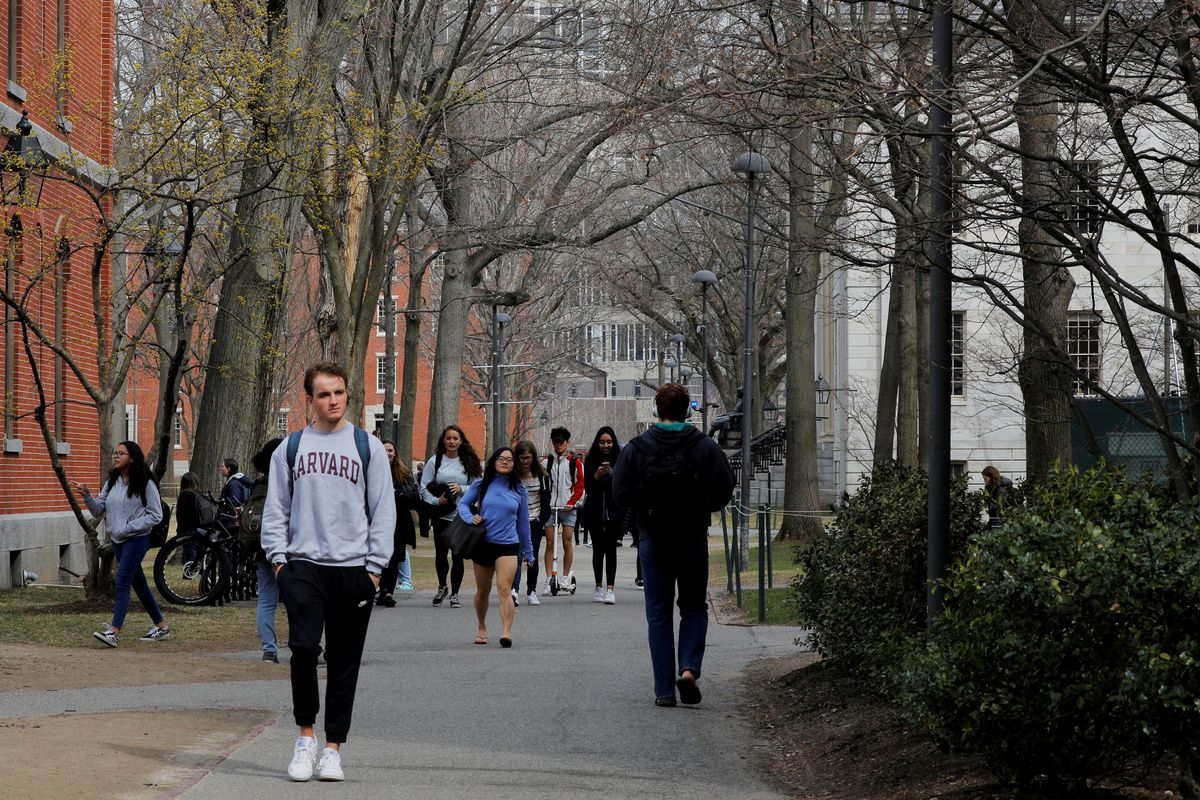 Students walk through Harvard University