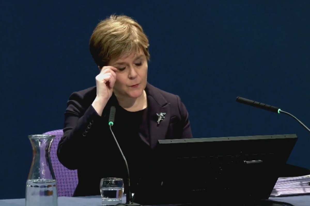 Sturgeon wiping away tears