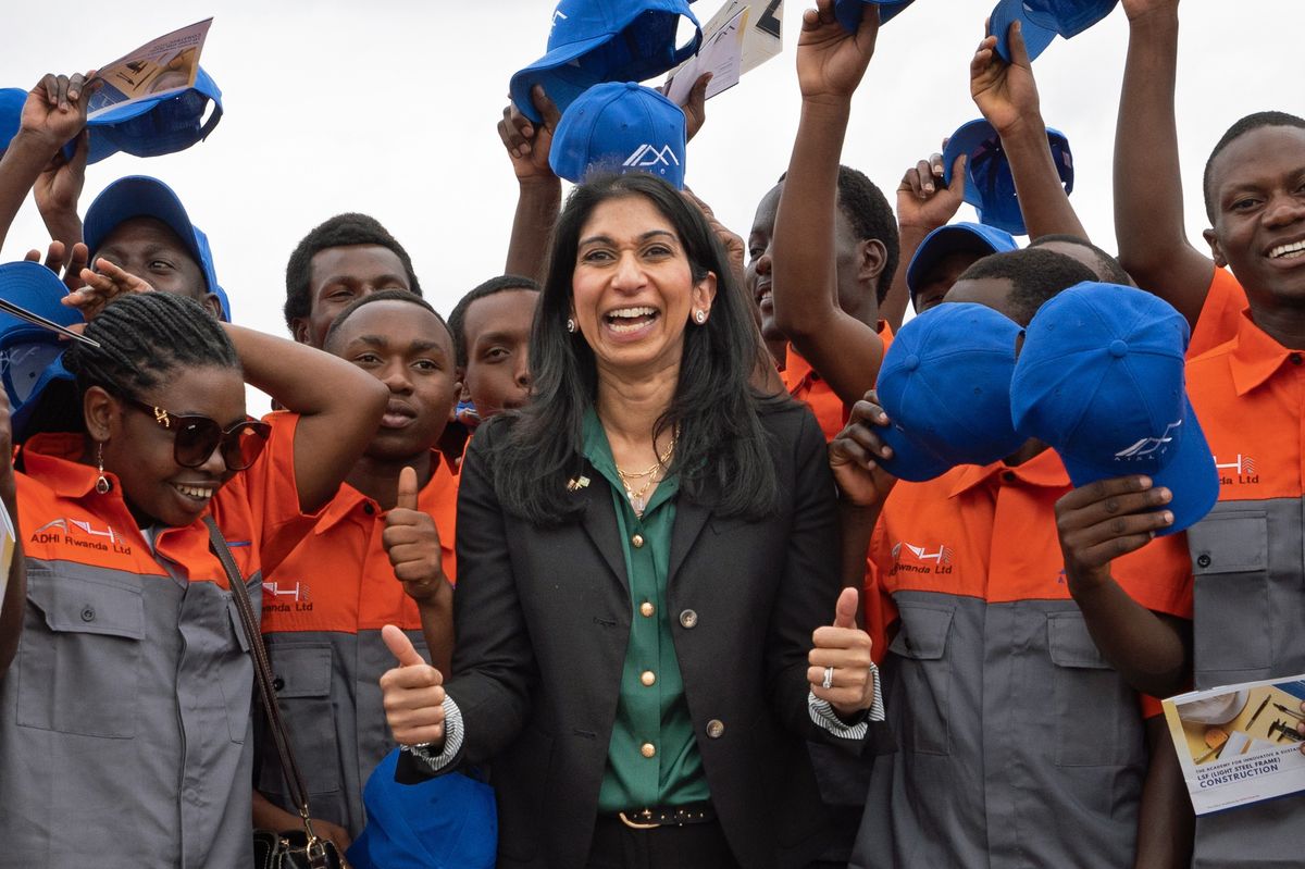 Suella Braverman with Rwandan graduates