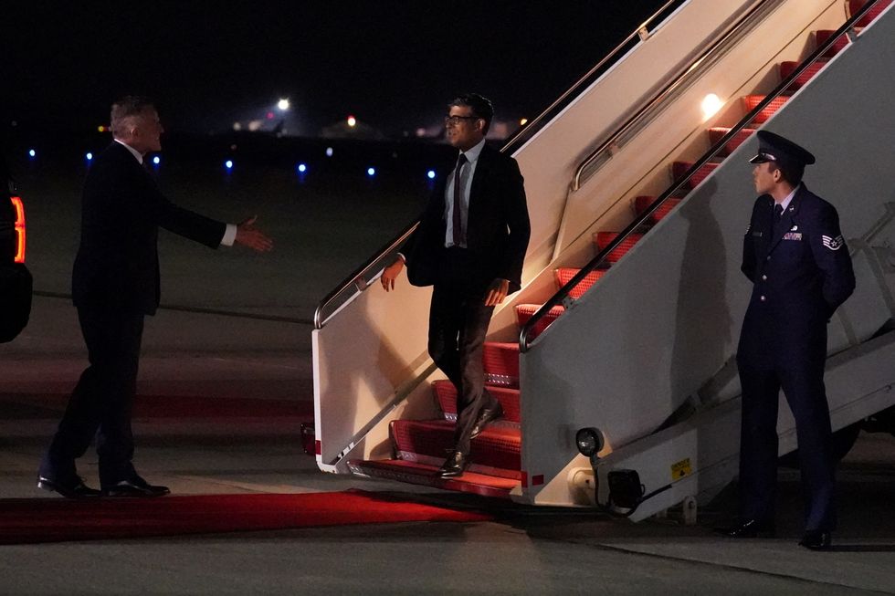 Sunak exiting jet in America