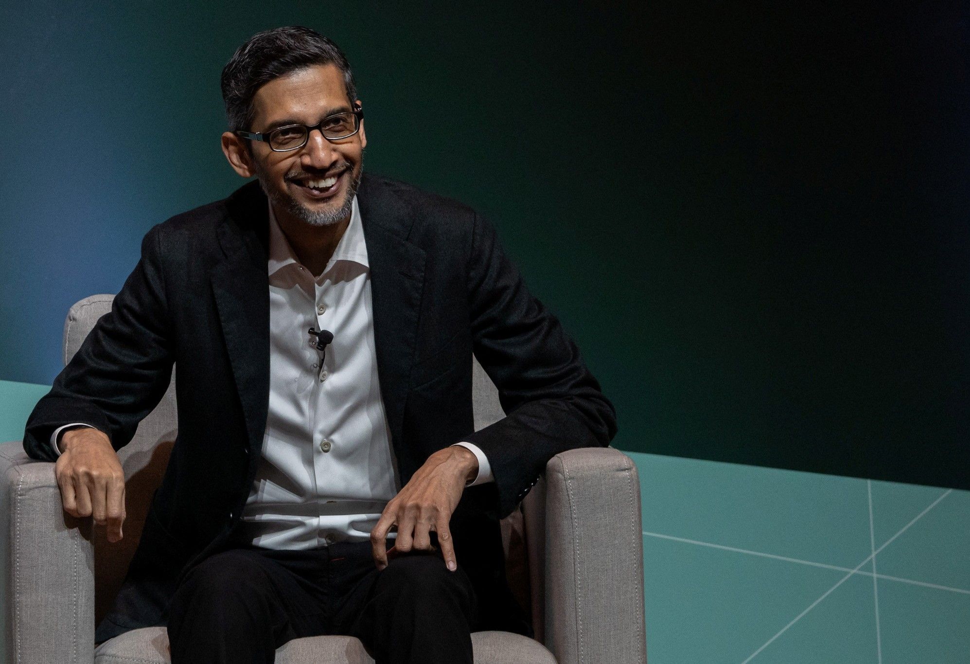 Sundar Pichai, CEO of Google and Alphabet Inc, is pictured on-stage at the 2024 Business, Government, and Society Forum at the Stanford Graduate School of Business in Stanford, California