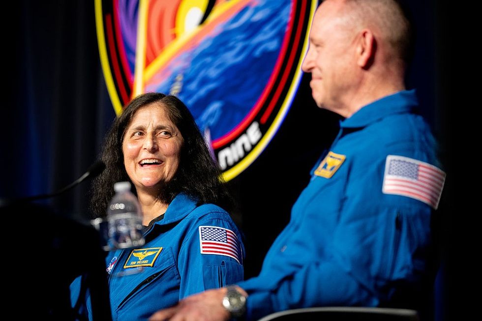 Sunita "Suni" Williams, and Barry "Butch" Wilmore speak during a news conference at the NASA Johnson Space Center
