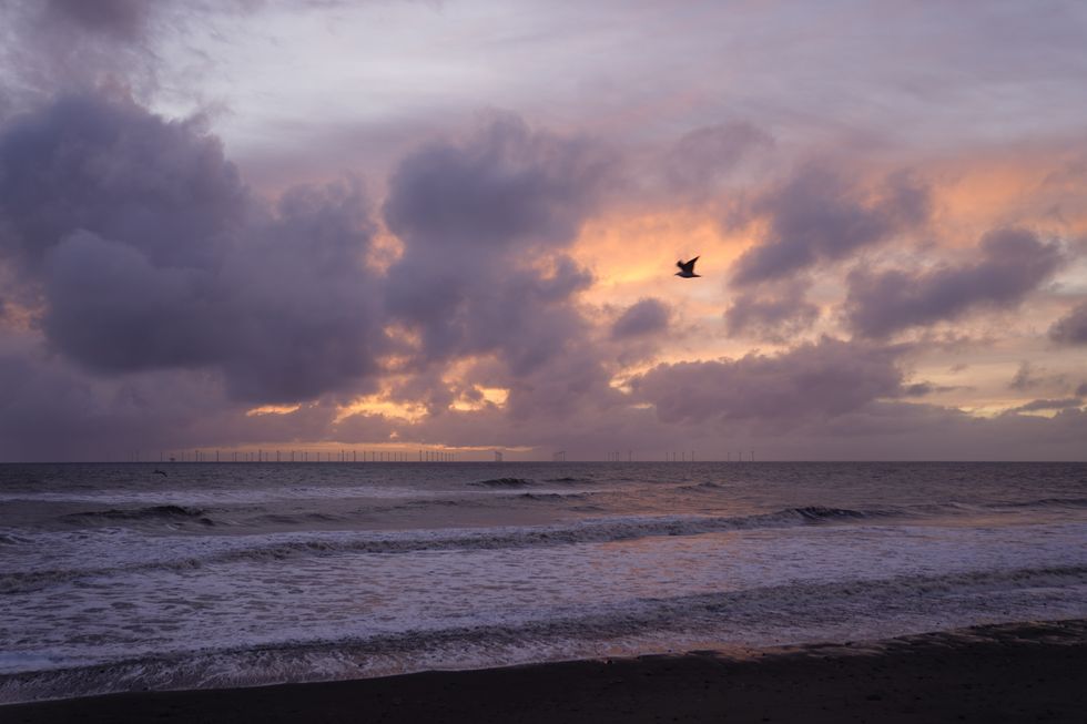 Sunrise over Easington beach, Hull, after a crash between an oil tanker and a cargo ship off the coast of East Yorkshire