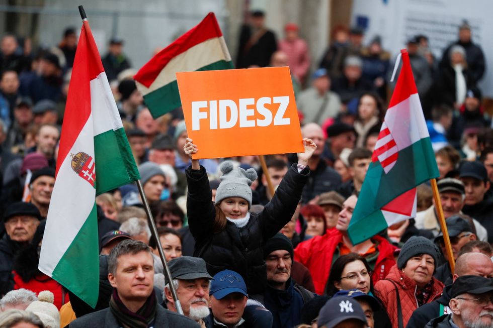 Supporters of Hungarian Prime Minister Viktor Orban are seen during the closing rally of his electoral campaign in Szekesfehervar, Hungary, April 1, 2022. REUTERS/Bernadett Szabo