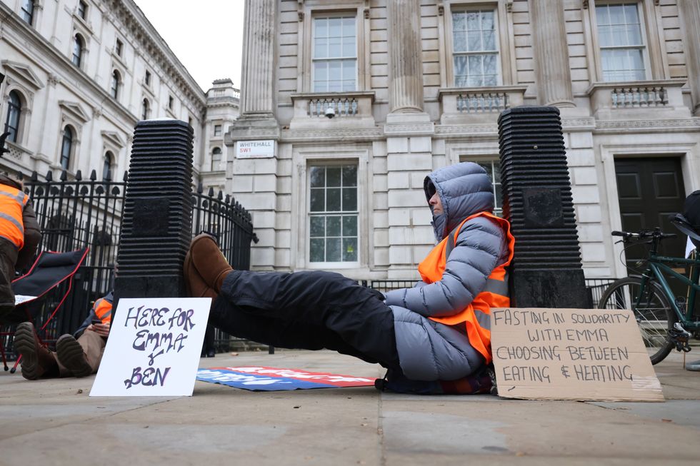 Supporters of Insulate Britain stage a 24 hour fast outside Downing Street, London, in a call for action on fuel poverty.