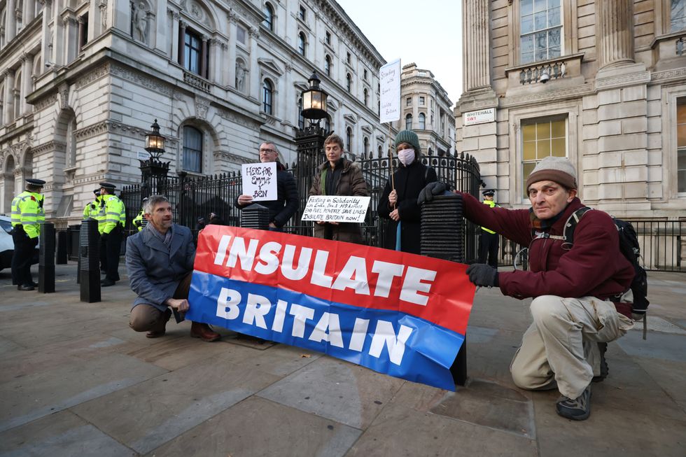 Supporters of Insulate Britain stage a 24 hour fast outside Downing Street