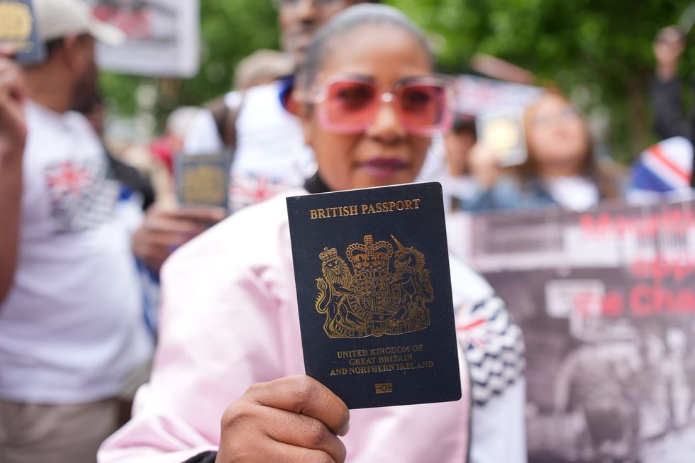 Supporters outside the High Court in central London, during a hearing over a last-minute block on the Government from concluding its deal on the Chagos Islands