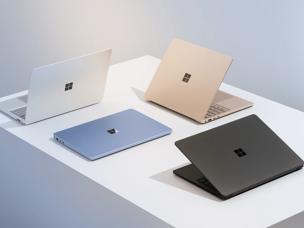 surface laptop 6 pictured in all four colour options on a table