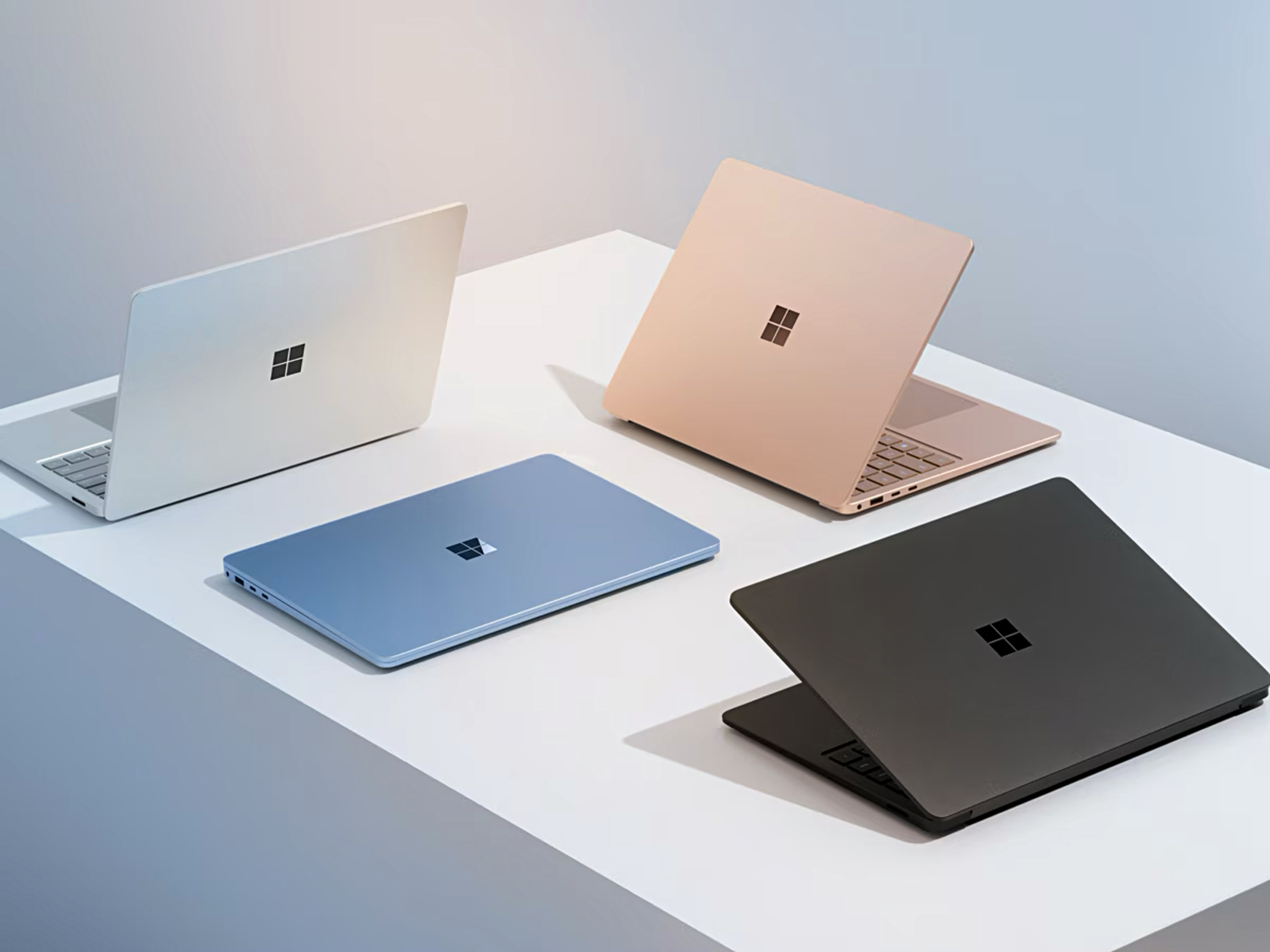 surface laptop 7th edition pictured in all four colour options on a table