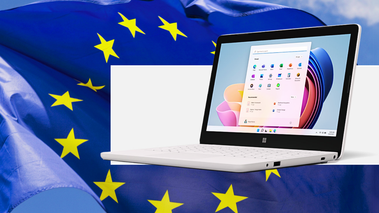 Surface Laptop SE, designed and sold by Microsoft to showcase its Windows 11 operating system, pictured inset, with the European Union flag in the background