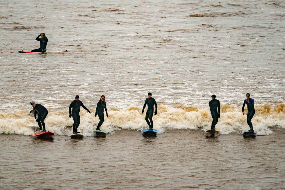 Surfers at Severn Bore