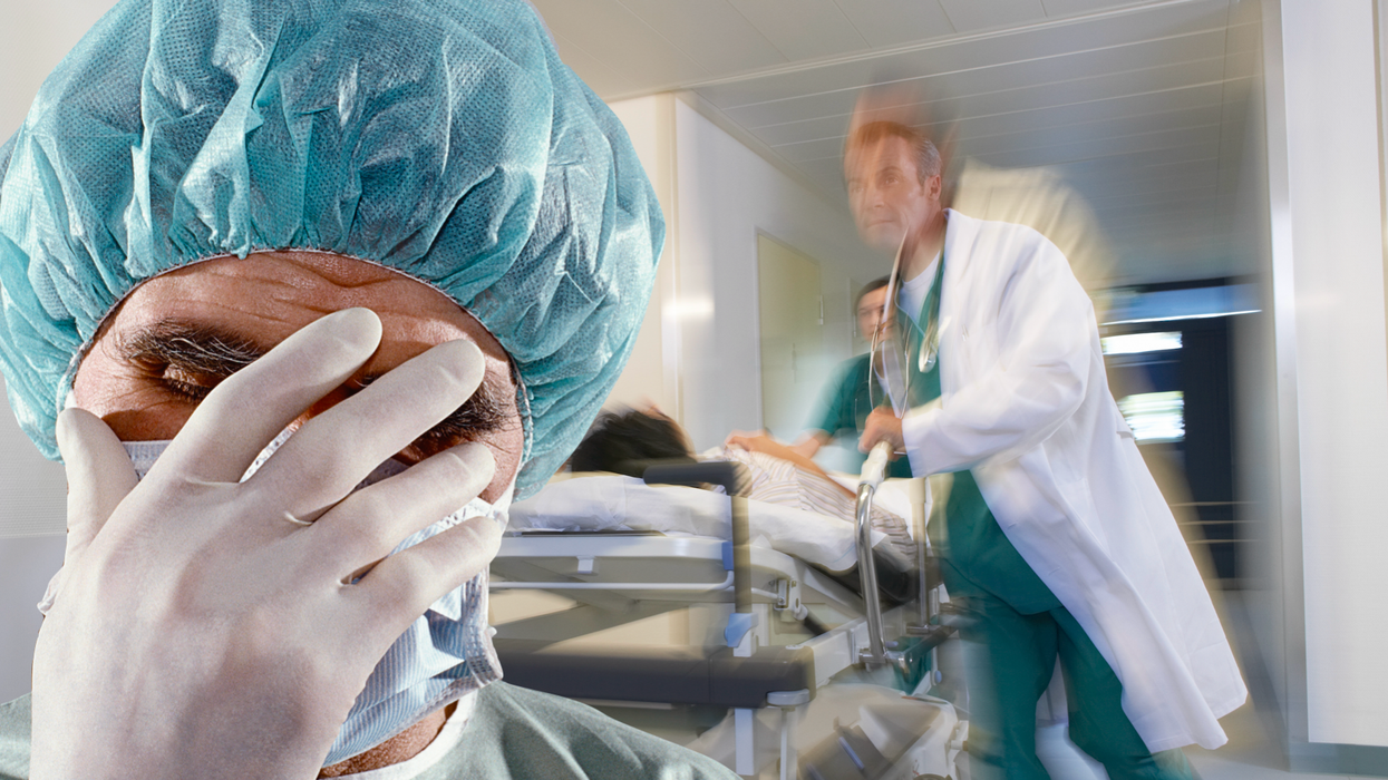 Surgeon panicking in a hospital ward