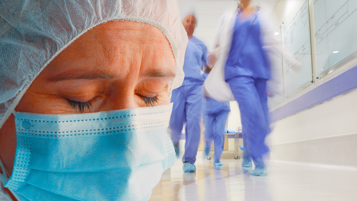 Surgeon upset in a busy hospital ward