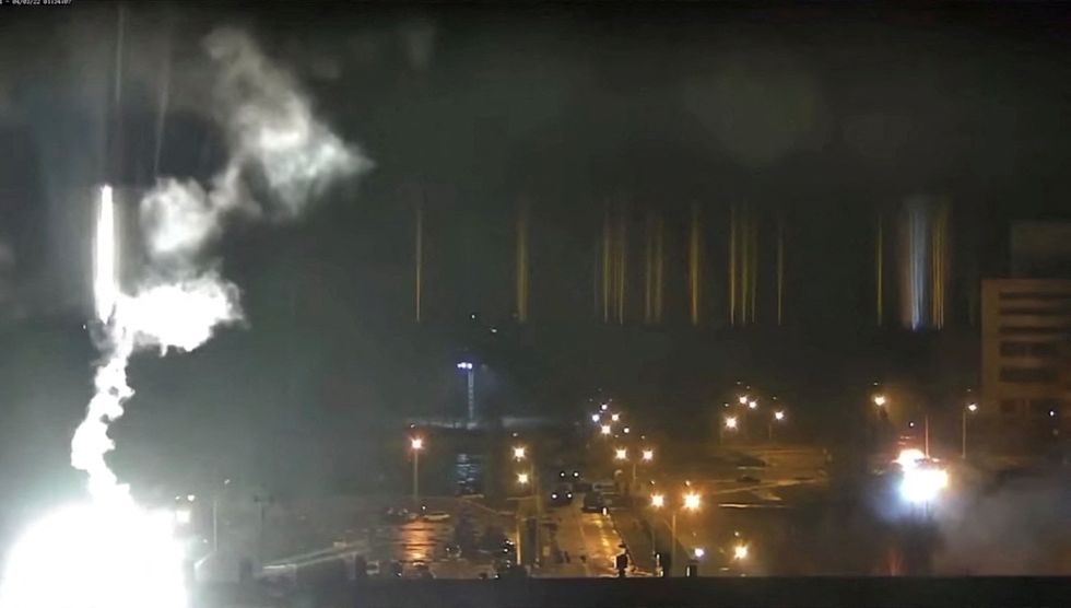 Surveillance camera footage shows a flare landing at the Zaporizhzhia nuclear power plant during shelling in Enerhodar, Zaporizhia Oblast, Ukraine March 4, 2022, in this screengrab from a video obtained from social media. Zaporizhzhya NPP via YouTube/via REUTERS THIS IMAGE HAS BEEN SUPPLIED BY A THIRD PARTY. MANDATORY CREDIT. NO RESALES. NO ARCHIVES. REFILE - ADDITIONAL CAPTION INFORMATION