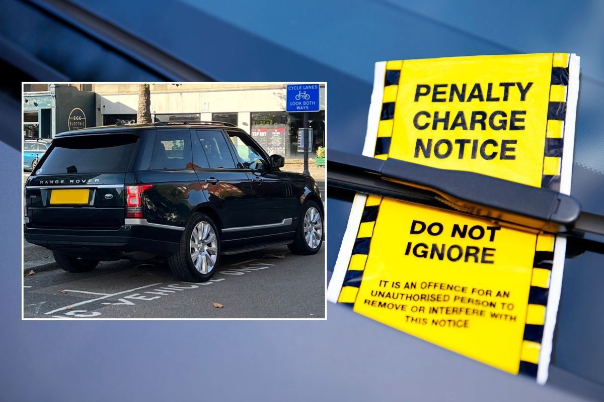 SUV parked over the lines and a penalty charge notice