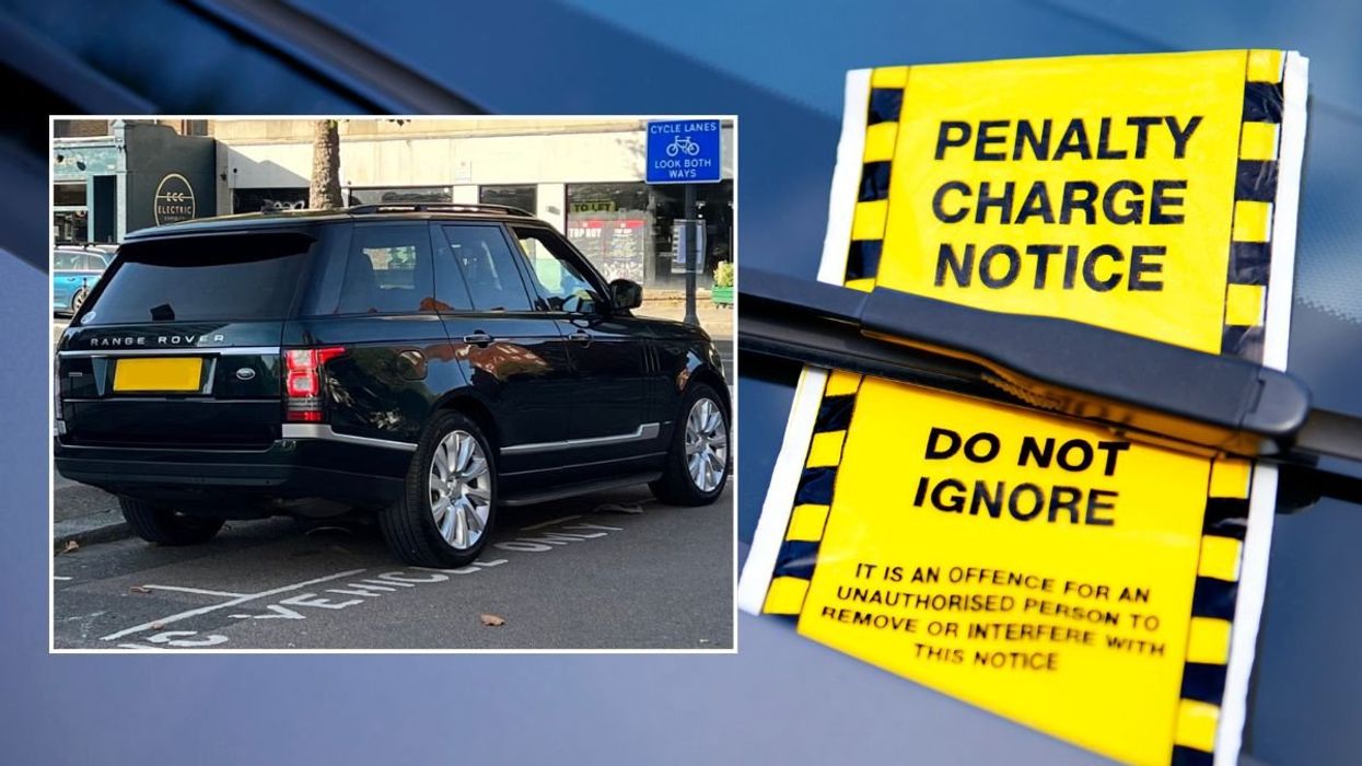 SUV parked over the lines and a penalty charge notice