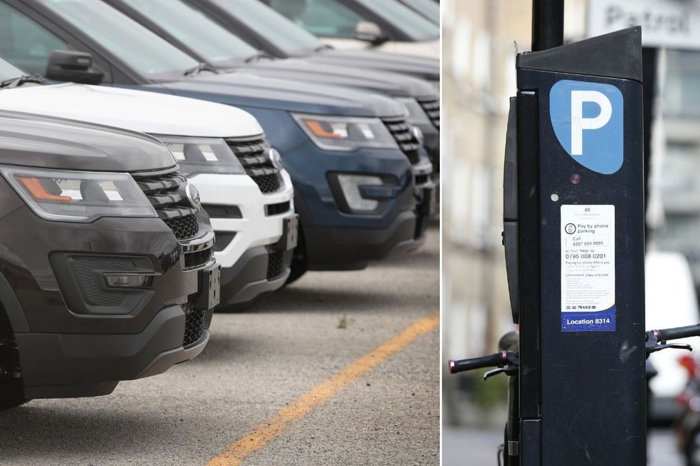 SUVs parked and a car parking machine