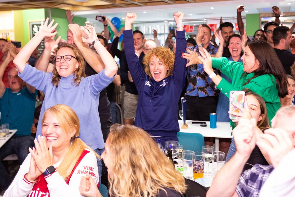 Suzanne Williams (centre), Strength and Conditioning coach for Emma Raducanu aged 8-12, at the Parklangley Club in Beckenham, celebrates her winning the US Open Final.