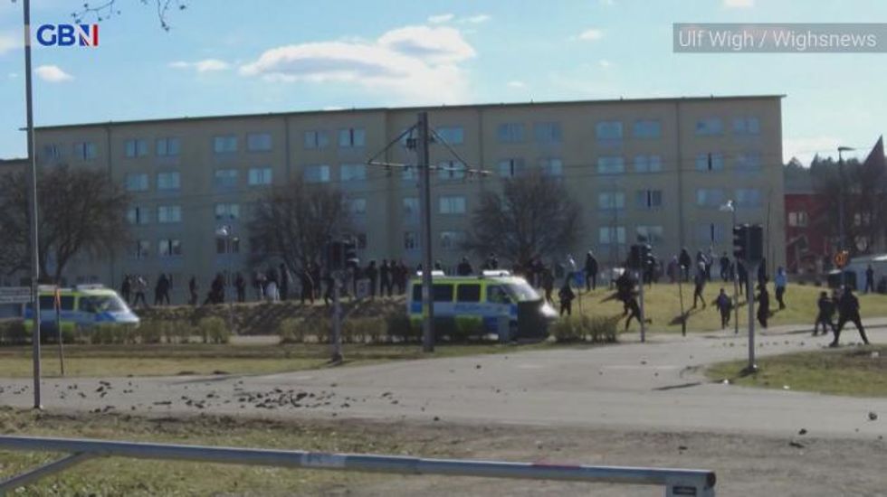 Qu'ran burnings spark riots in Sweden - shocking footage shows police attacked and cars set on fire